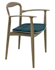 Verona B Chair with sculpted wooden frame and curved arms| theMADgroup