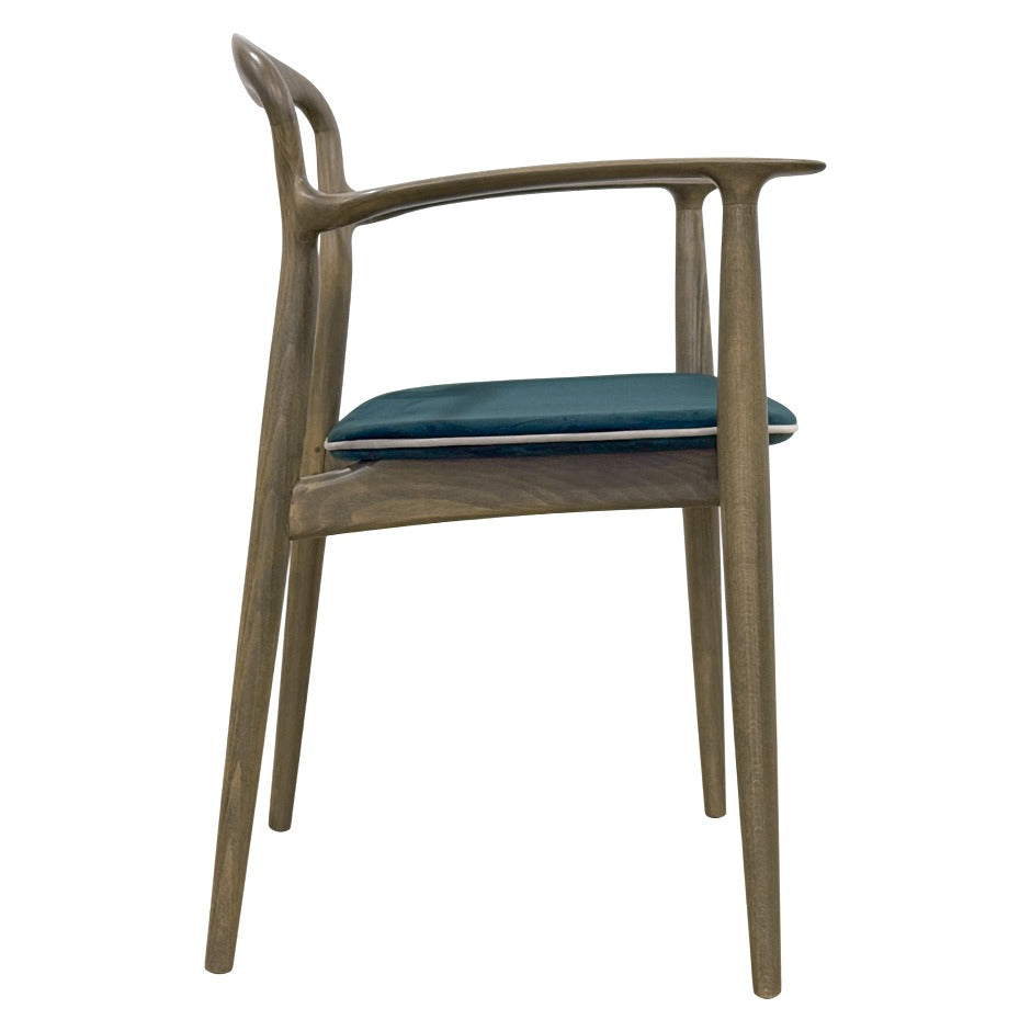 Verona B Chair with sculpted wooden frame and curved arms| theMADgroup